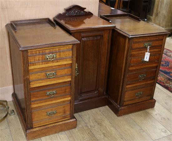 A pair of Victorian mahogany four-drawer pedestals (converted to bedside chests) and a pot cupboard W.40cm